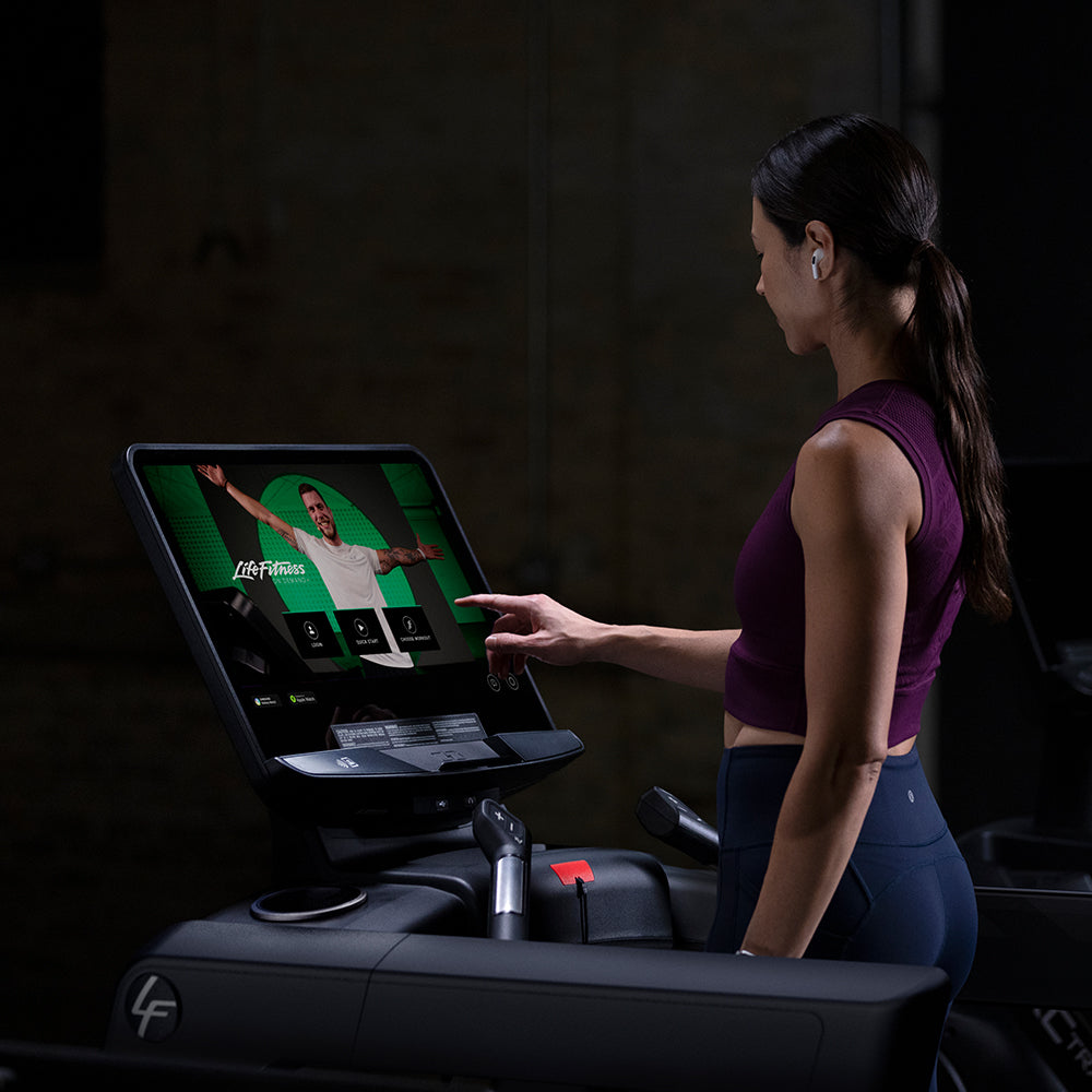 User on Club Series+ Treadmill