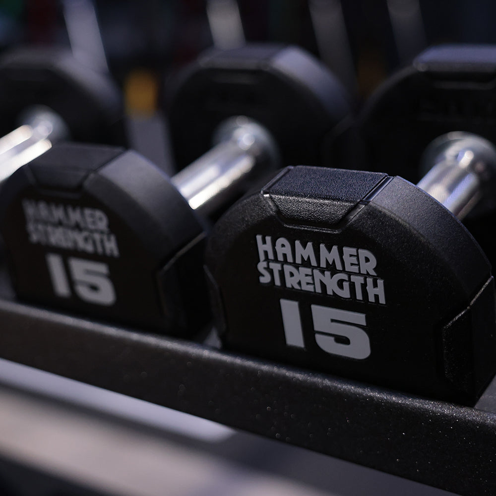 15 LB Hammer Strength Dumbbells on rack