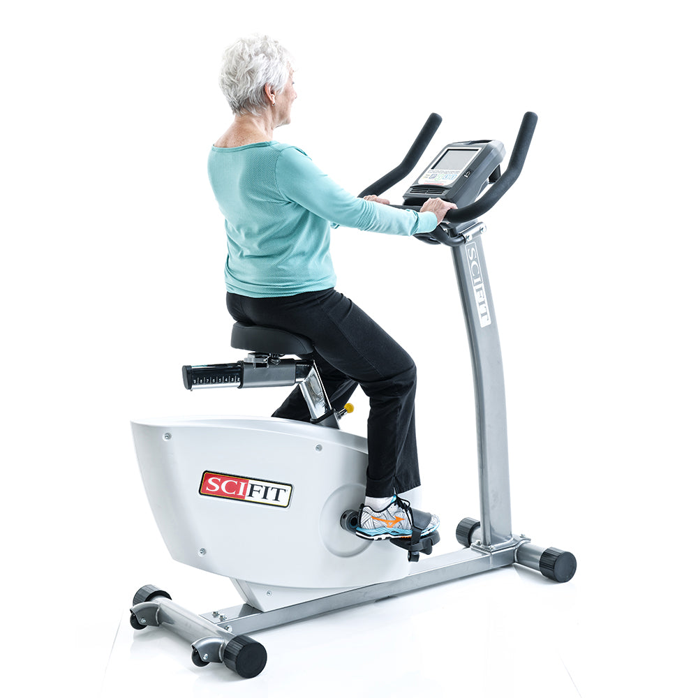 Exerciser pedaling on SciFit ISO7000