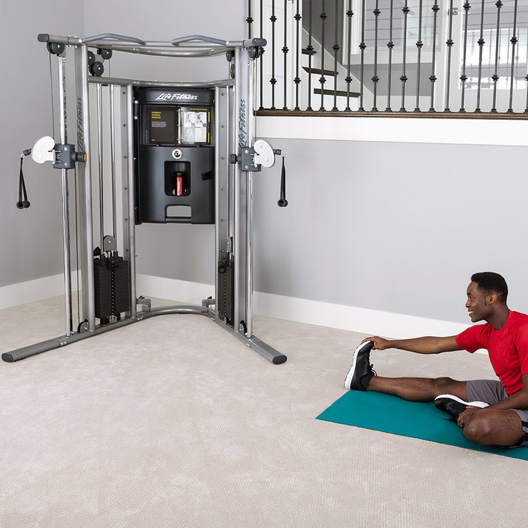 G7 Home Gym with man stretching beside, at home