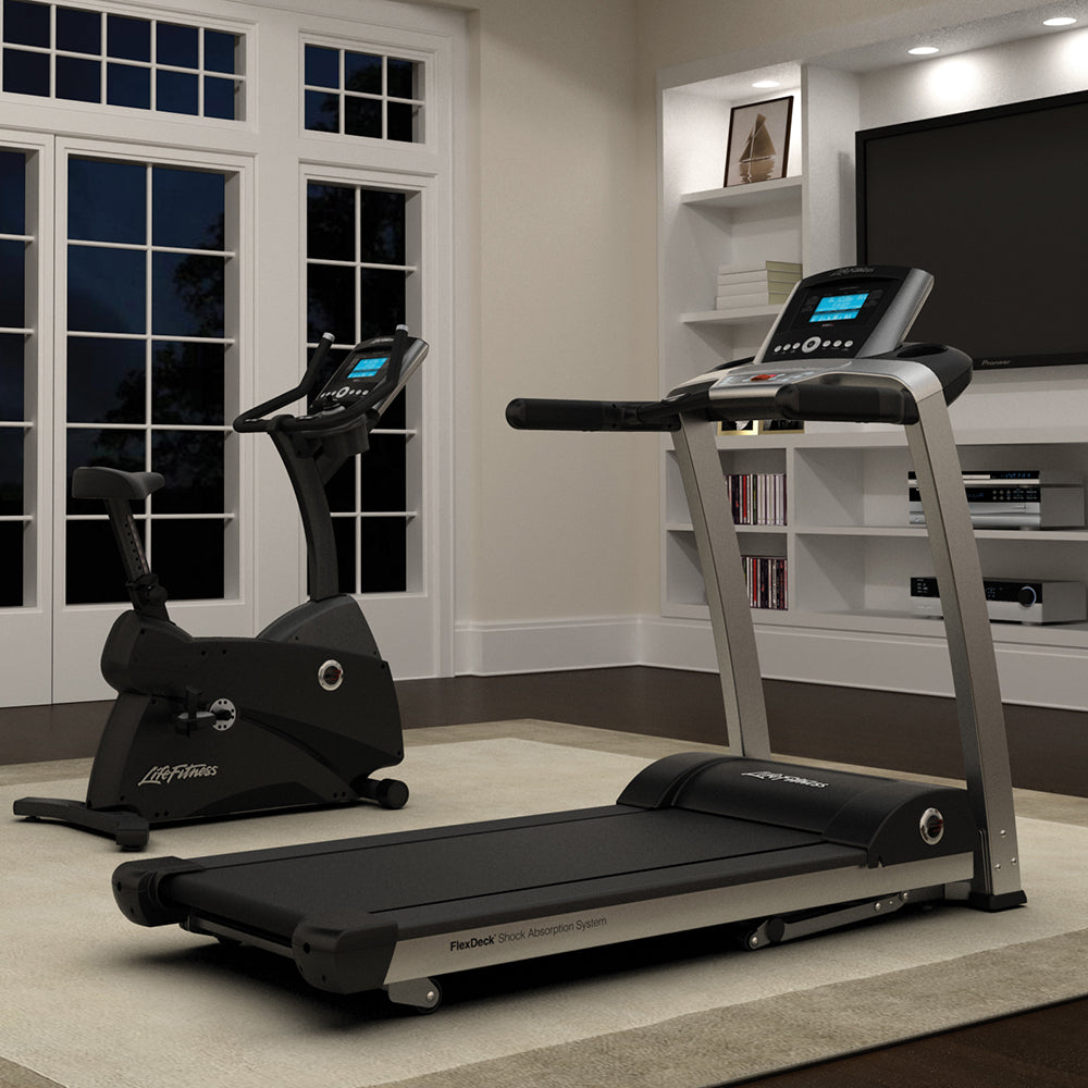 F3 Treadmill in living room next to Lifecycle bike