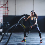 Female exercising with Battle Rope