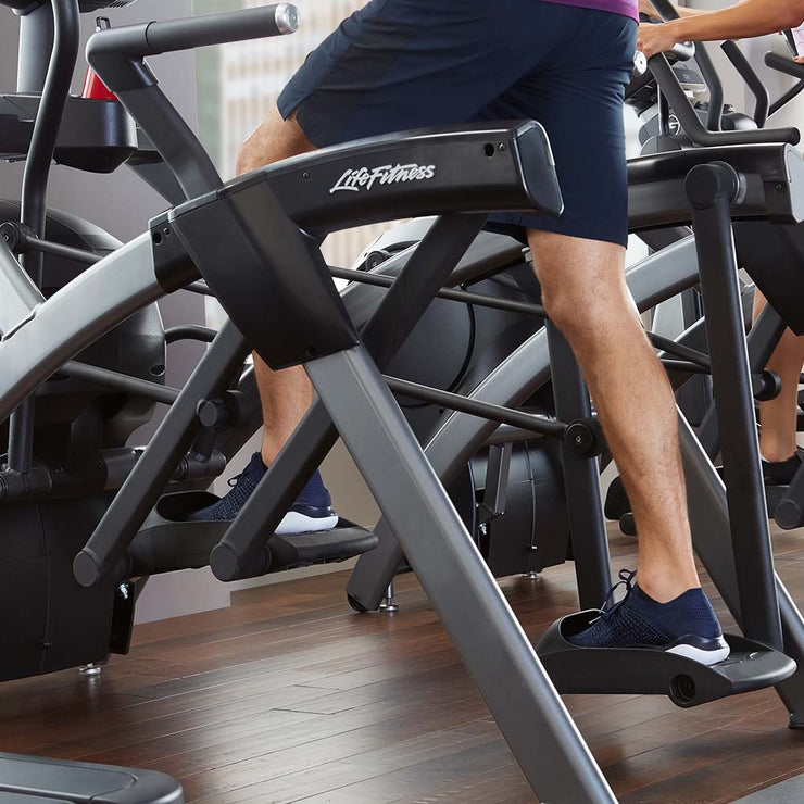 man exercising on Life Fitness Lower Body Arc Trainer
