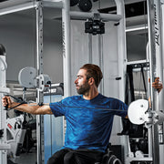 Man exercising in gym with Signature Series Dual Adjustable Pulley
