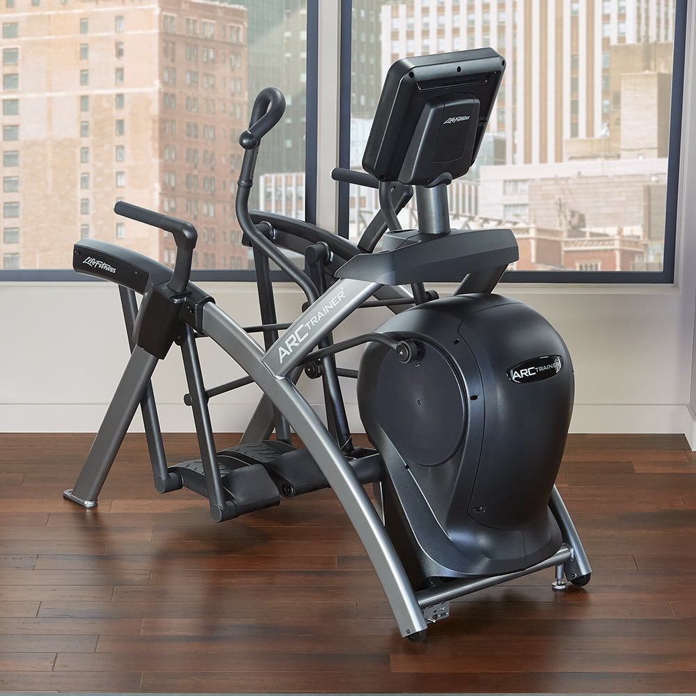 Life Fitness silver and black total body exercise machine in highrise apartment
